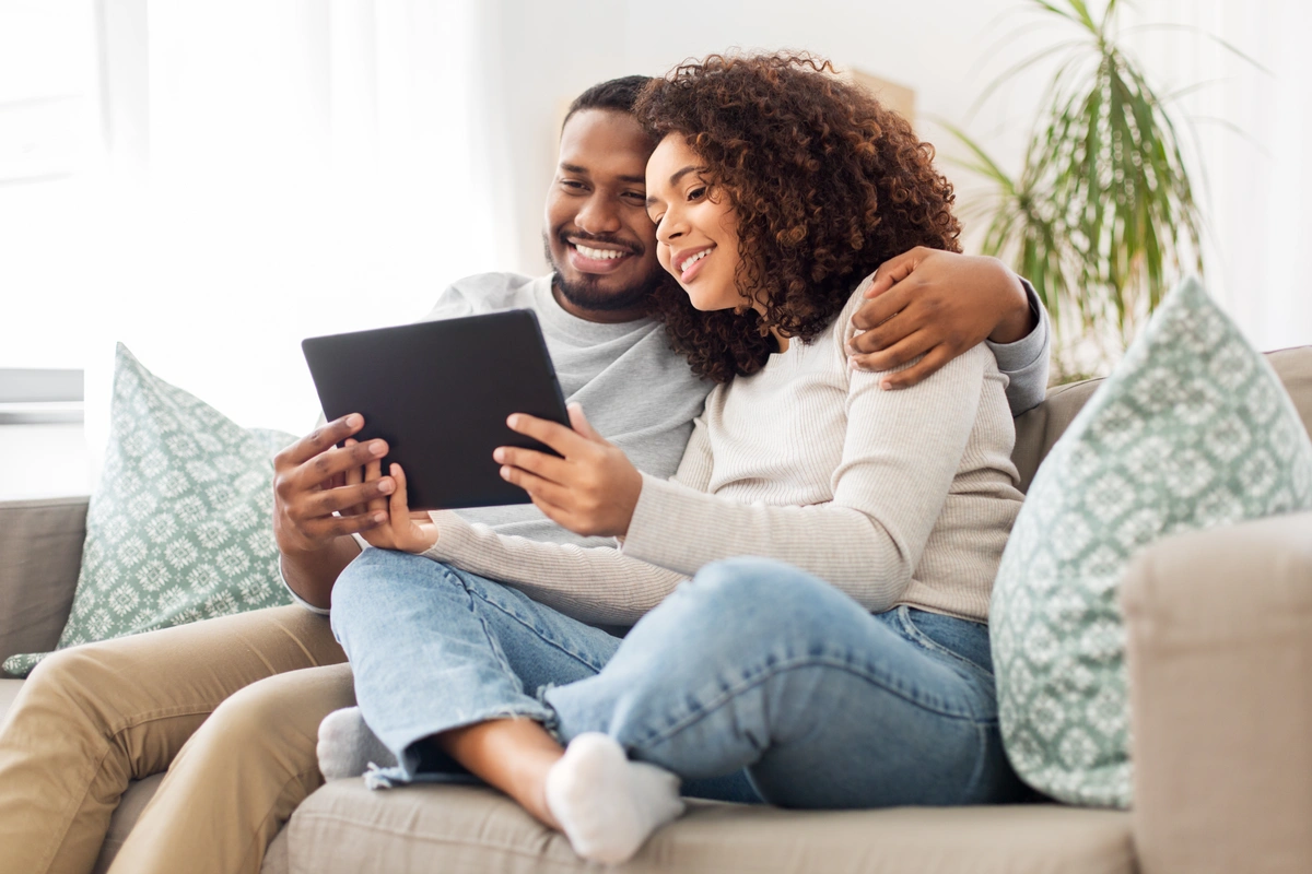 couple looking for roof repairs