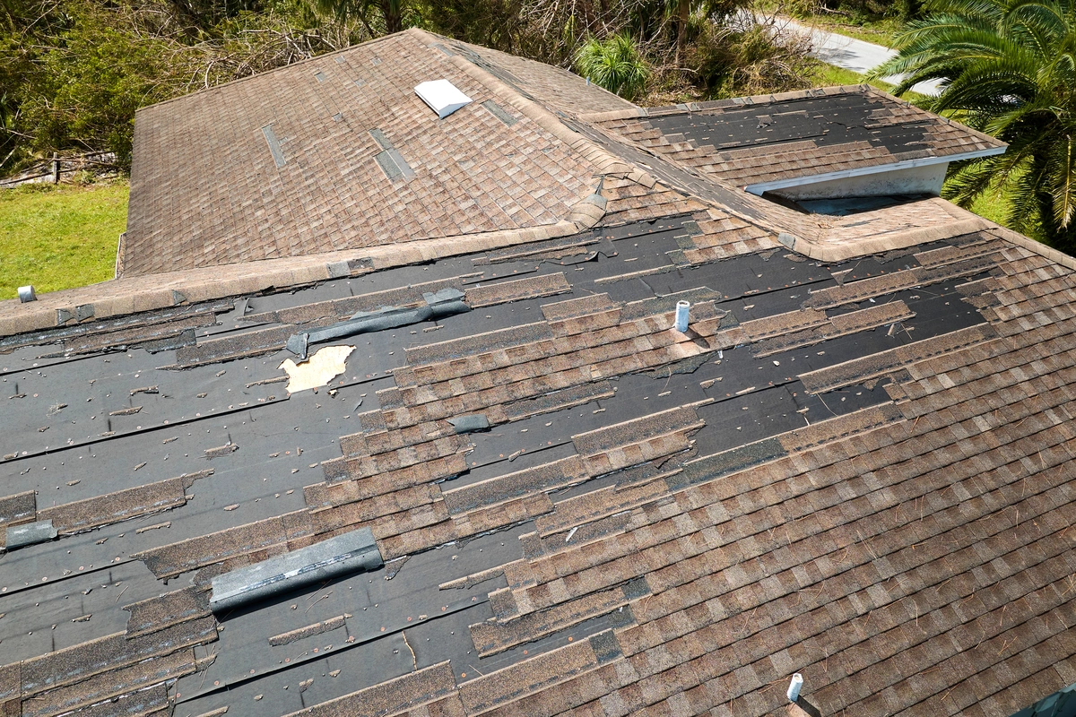 emergency roof repair dealing with torn off shingles