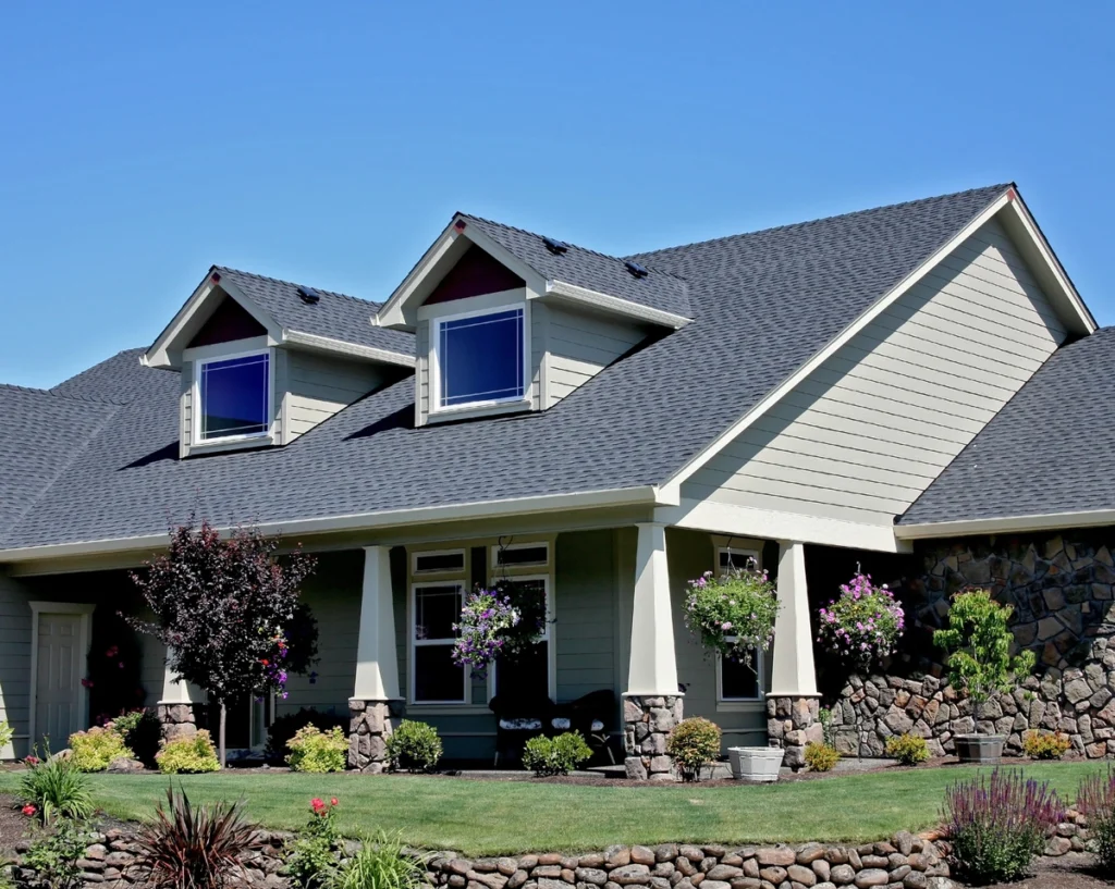 asphalt roofing shingles installed on large residential home