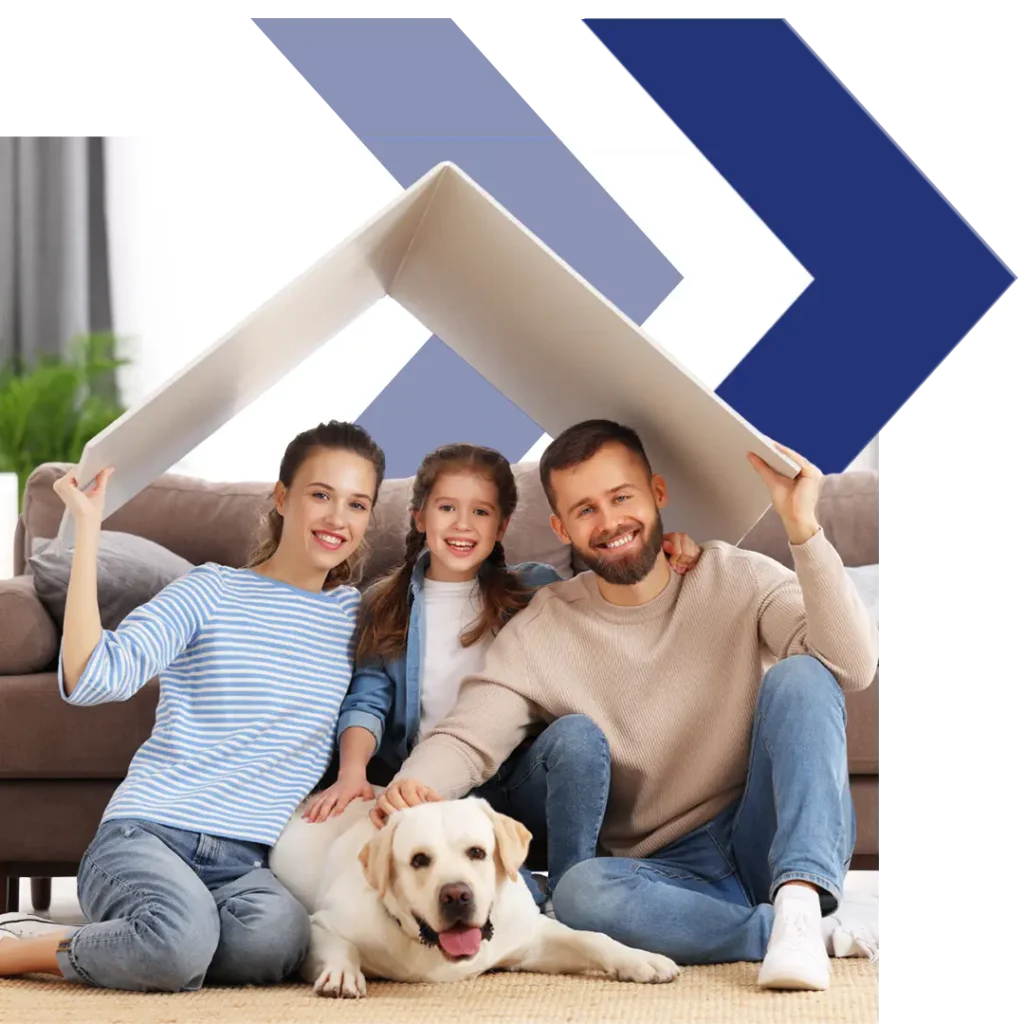 A family holding up a sign shaped like a roof.